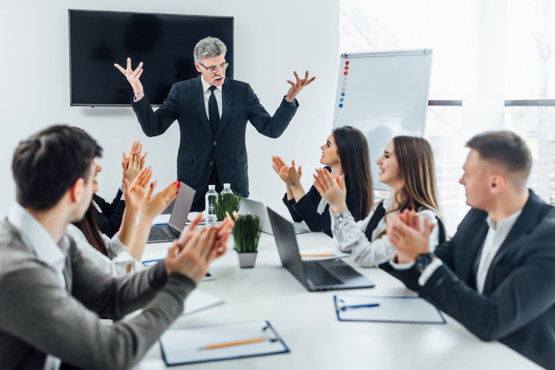 Corporate leaders attending a leadership coaching session