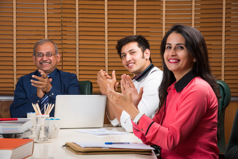 Corporate executives participating in a negotiation skills training session